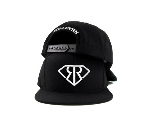 Black snapback hat on white background. Embroidered white RR logo in front and "Rich & Rotten" text on the back