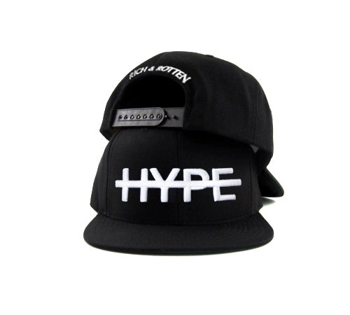 Black snapback hat with embroidered word HYPE in strikethrough style on white background. White Rich and Rotten text on the back side