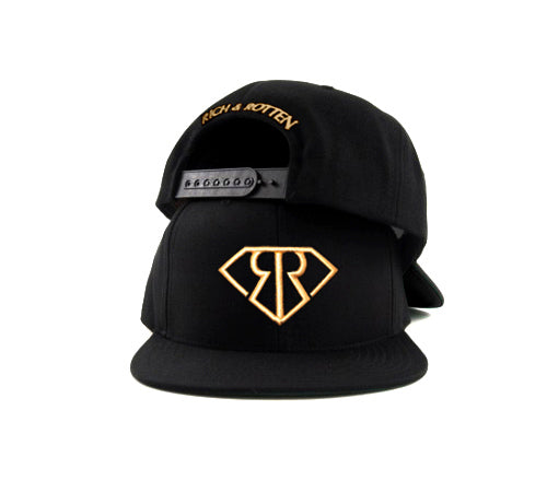 Black snapback hat on white background. Embroidered golden RR logo in front and "Rich & Rotten" text on the back