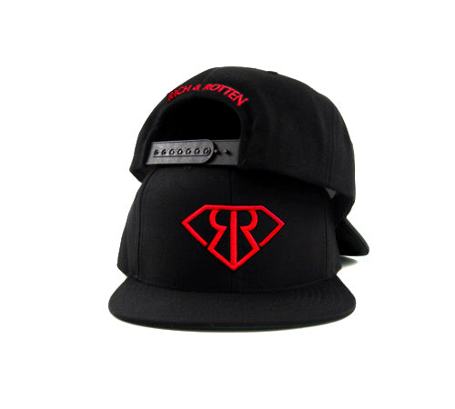 Red snapback hat on white background. Embroidered RR logo in front and "Rich & Rotten" text on the back